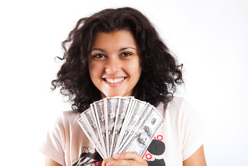 Meiden met geld - foto Tax Credits Flickr